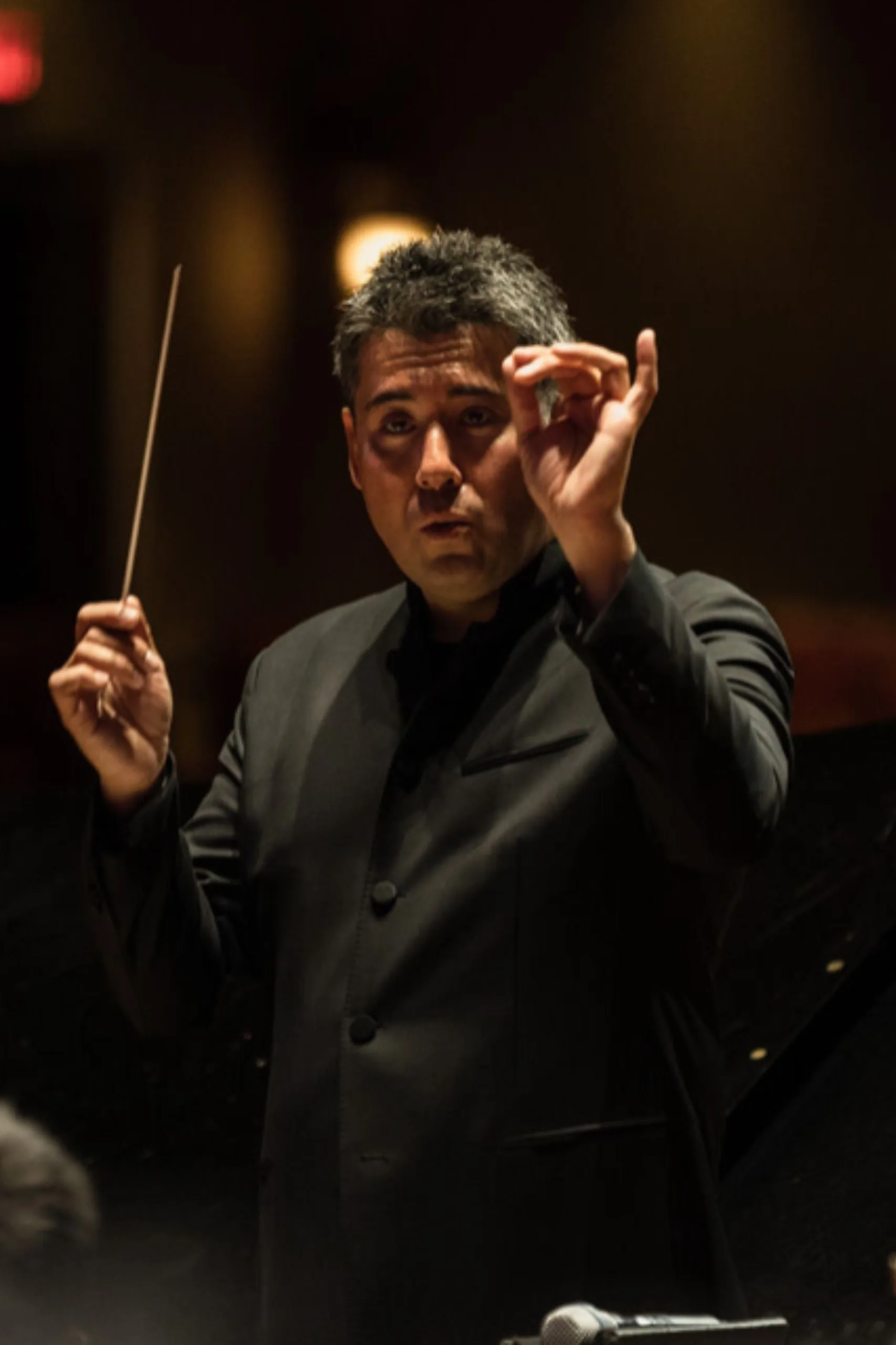 Ian Conducting Dennis Colpitts photo