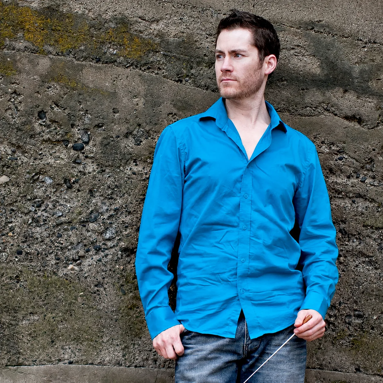 Jeff Faragher OSYO Conductor in a blue shirt